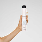 milk-shake-dry-shampoo-in-hand